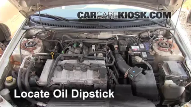 2002 Mazda Protege ES 2.0L 4 Cyl. Aceite Controlar nivel de aceite